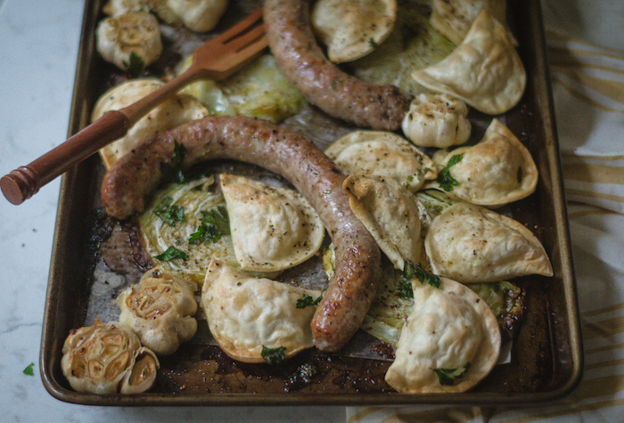 Easy recipe for sheet pan sausage and pierogies